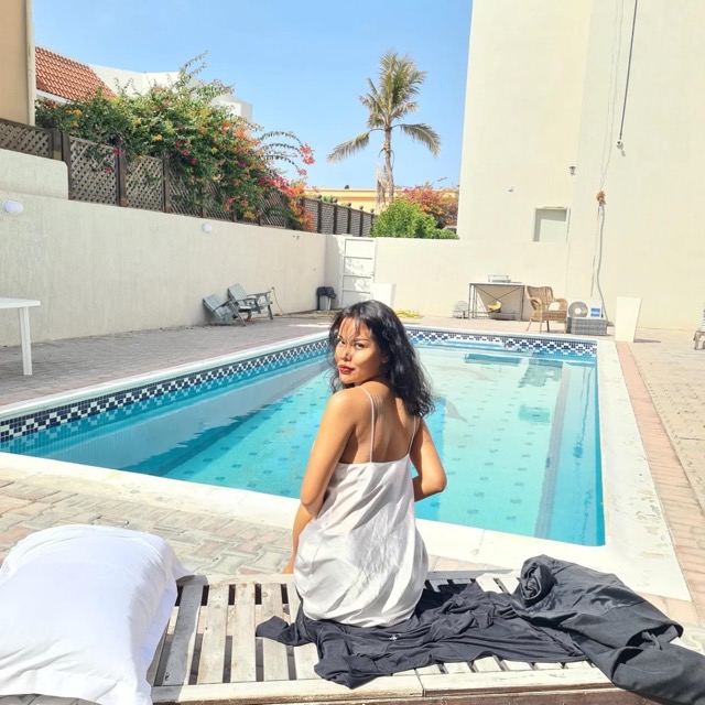 Relaxing by the pool